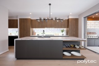 Polytec - Island front in Cinder Matt, Cabinetry in Notaio Walnut Ravine.