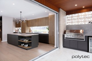 Polytec - Doors and panels in Cinder Matt,  and Notaio Walnut Ravine.