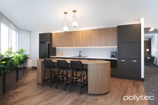 Polytec - Doors and panels in Cinder Matt, Island benchtop in Prime Oak Matt, Overhead cupboard doors in Prime Oak Matt, Benchtop in Chambord Matt.