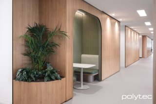 Polytec - Wall panels, planter and seating in Tasmanian Oak Matt.