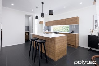 Polytec - Doors and panels in Notaio Walnut Ravine.
