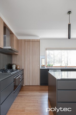 Polytec - Doors and panels in Natural Oak Ravine,  and Cinder Matt.