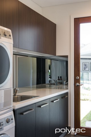 Polytec - Doors and panels in Black Wenge Ravine,  and Jamaican Walnut Matt.