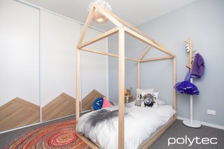 Polytec - Wardrobe feature in Natural Oak Ravine.