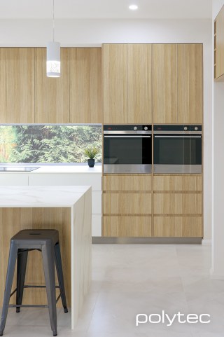 Polytec - Doors and panels in Blossom White Matt,  and Natural Oak Ravine, Benchtop in Calacutta D'oro Smooth.