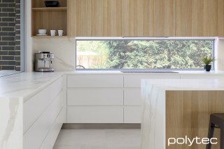 Polytec - Doors and drawers in Blossom White Matt,  and Natural Oak Ravine, Benchtop in Calacutta D'oro Smooth.